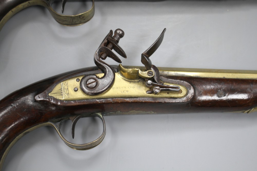 A pair of flintlock holster pistols by W. Ketland & Co, late 18th century,